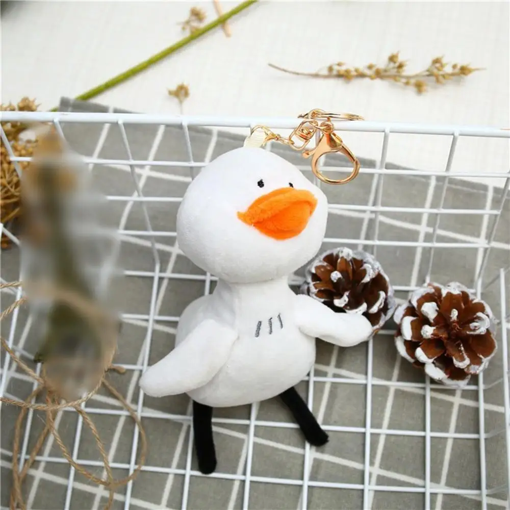 Плюшевые мягкие креативные брелки игрушки с милым мультипликационным принтом