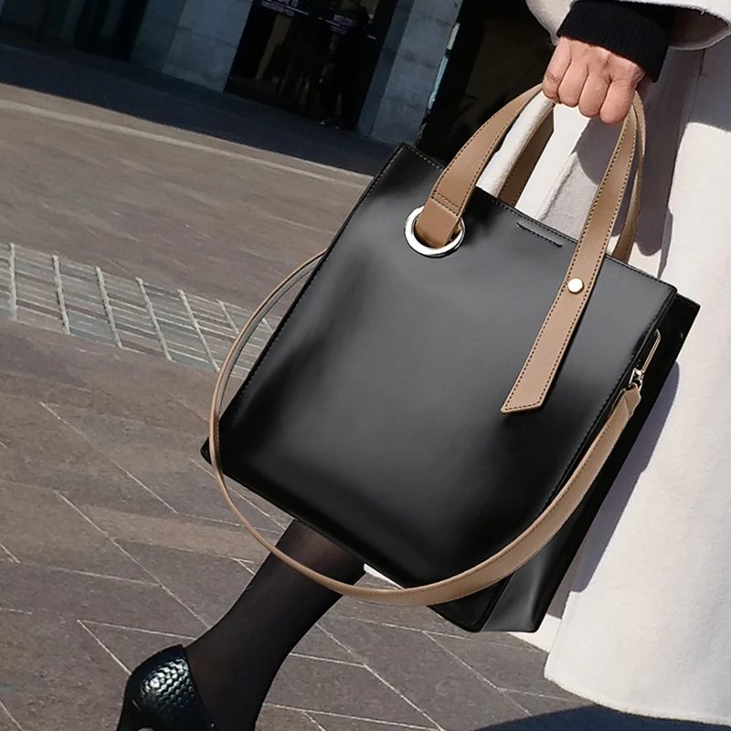 

Модная женская сумка из натуральной кожи, новинка 2020, трендовая портативная вместительная сумка на одно плечо, простая многофункциональная...