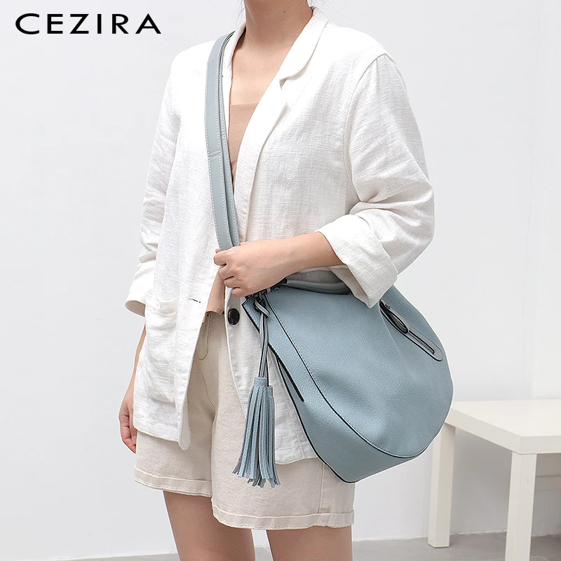 

697 fashion vegetarian leather lady tramp lady soft PU shoulder bag leisure tassel functional cross shaped handbag lady large ha