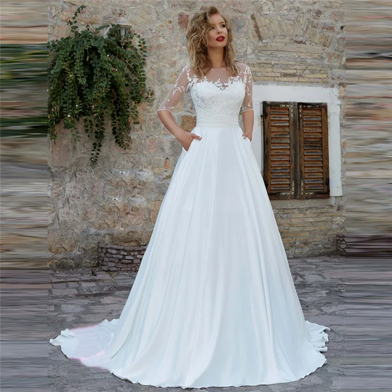 

Свадебное платье с кружевными аппликациями, открытой спиной и бантом, весна 2021