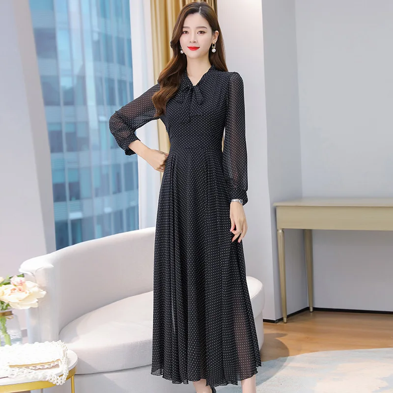 

Korean version of the large-size lace-up V-neck polka dot printing temperament is slim and white long-sleeved chiffon dress