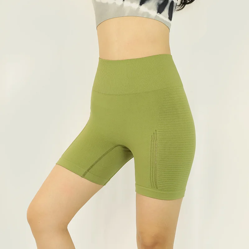 

20121 new seamless high elasticity high waist solid color fitness shorts seamless tight peach hip sports shorts