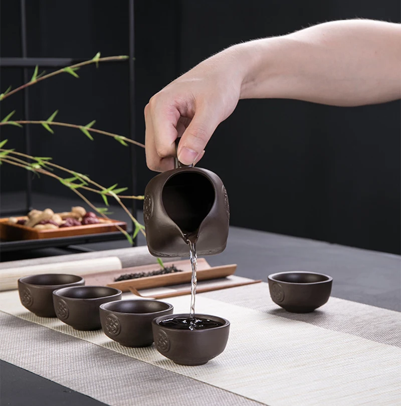 

Purple clay stone grinding semi-automatic Tea Set,creative Kung Fu tea Hot sales of tea set.Creative Tea ceremony supplies