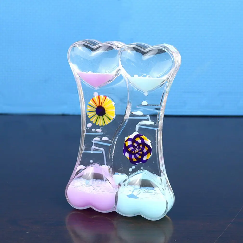 

Часы-песочные часы с жидким движением