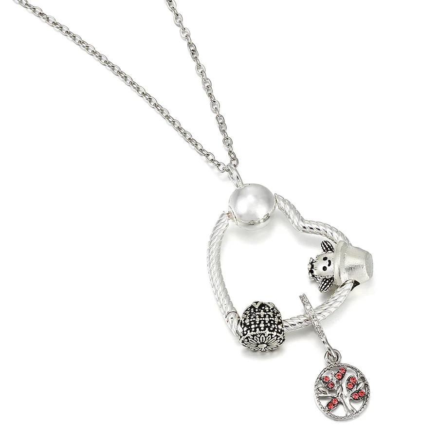 Женское колье с подвеской в виде сердца серебряного цвета | Украшения и