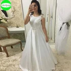 Простая Кепка рукавами свадебное платье трапециевидной формы атласное платье с открытой спиной, свадебное платье Vestido De Noiva 2021 Boda; Robe De Mariage Trouwjurk с бантом