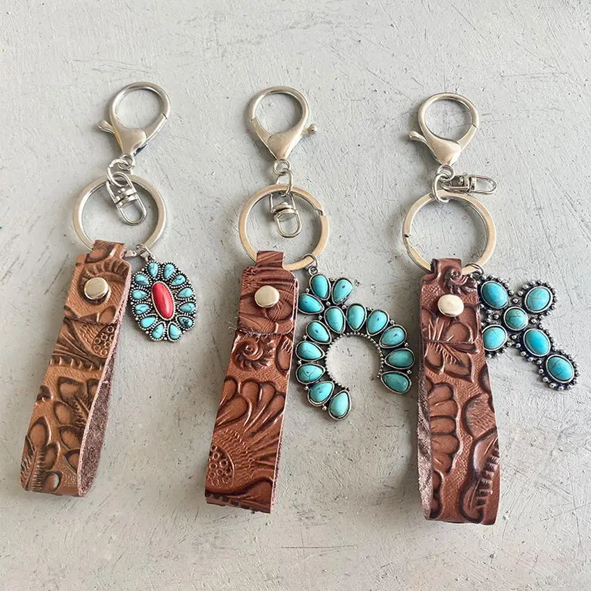 Винтажный брелок для ключей из натуральной кожи с тисненым цветком | Украшения и