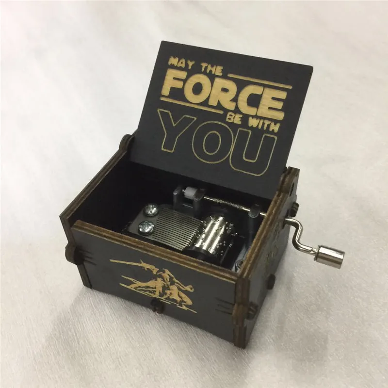 Деревянная музыкальная шкатулка ручной работы с выгравированной тематикой