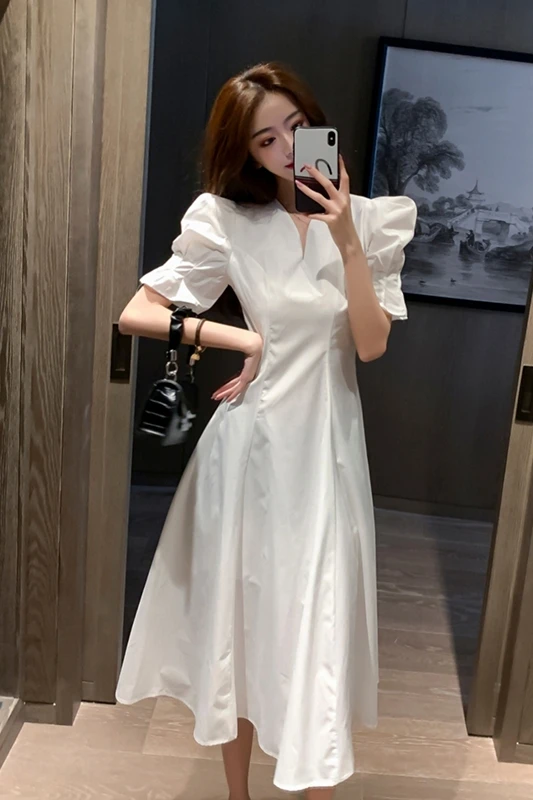 

White Dress Female 2021 Spring And Summer New Elegant Temperament Goddess Fan V-Neck Long Thin Skirt Fashion Dress