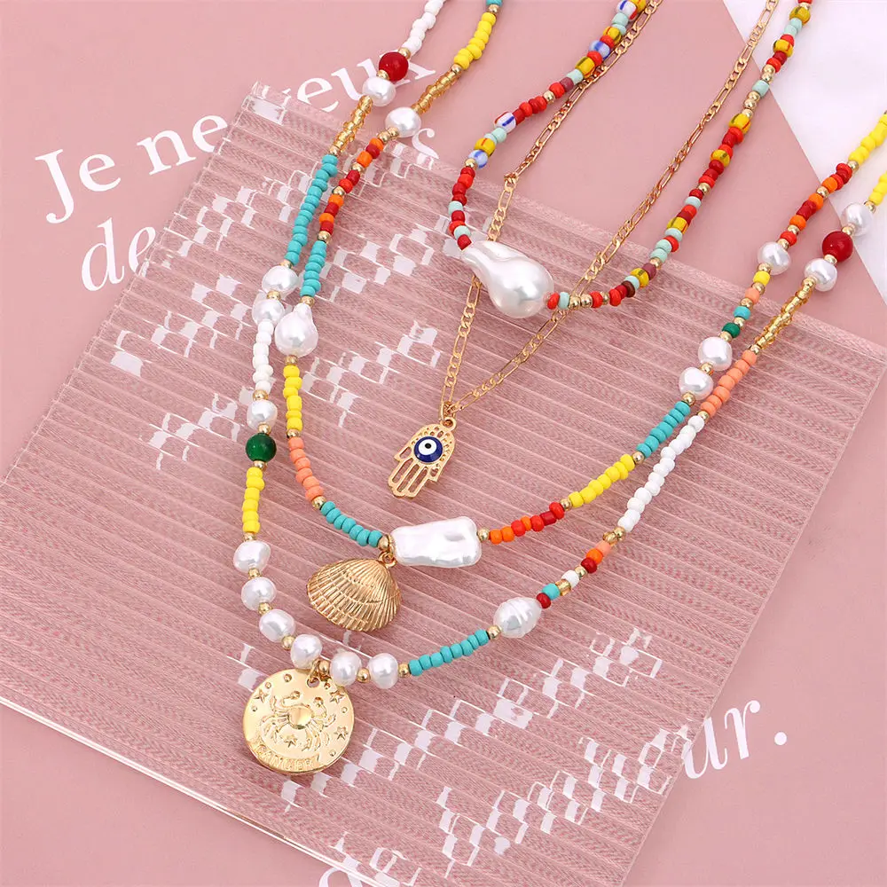 Ожерелье с жемчужной подвеской в стиле бохо цветные бусины золотая монета сглаза