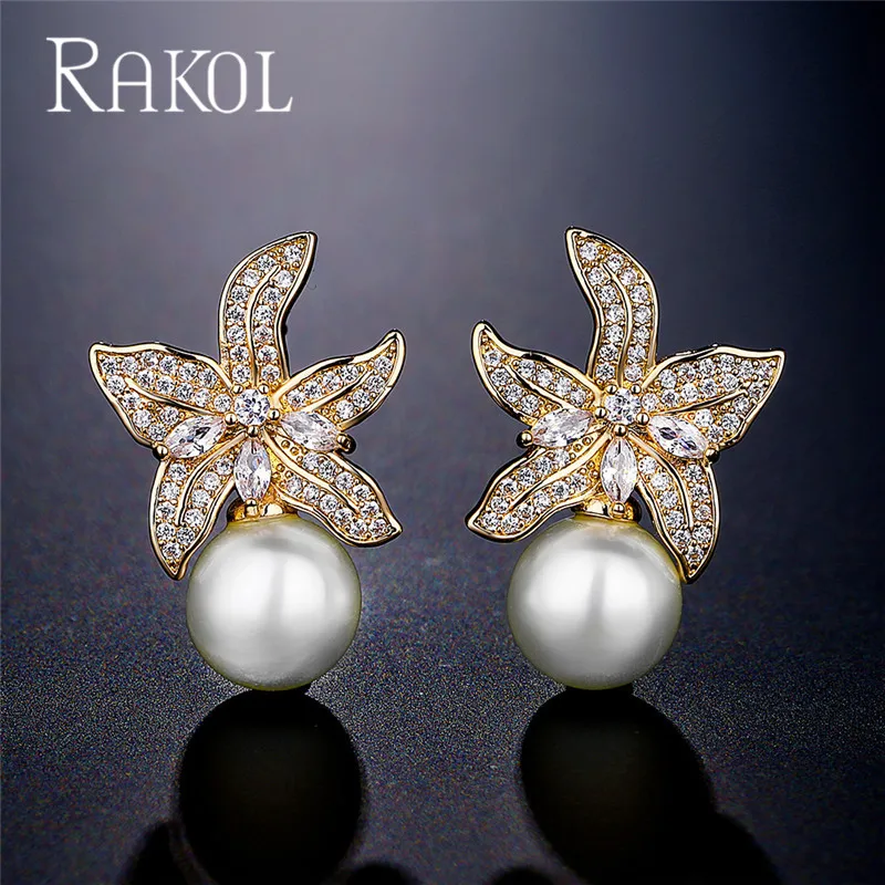 

Женские серьги-подвески с жемчугом и фианитом