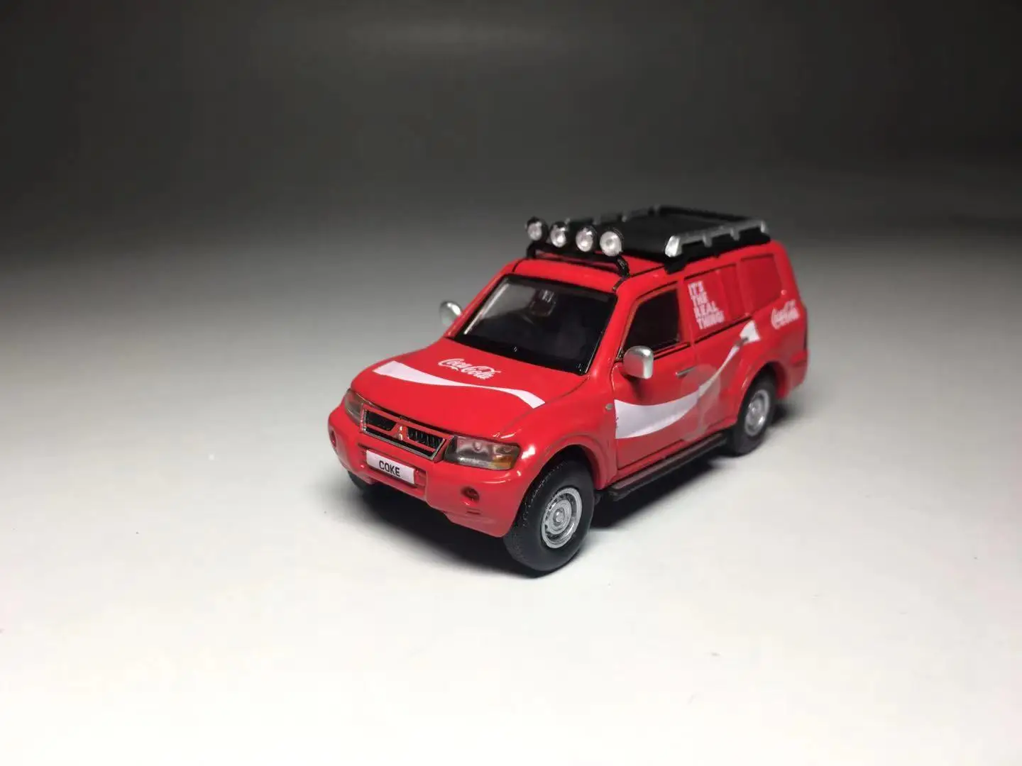 

Tiny 1/64 Mitsubishi Pajero COKE010 Die Cast Model Car Collection Limited