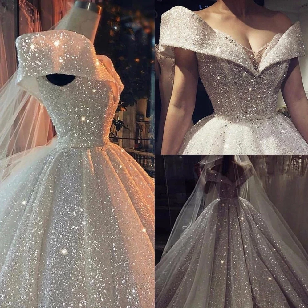 

Luxury Bridal Ball Gown Sweetheart Tulles Bling Sequins Wedding Gowns Sleeveless Floor Length Custom Made Bridal Dresses