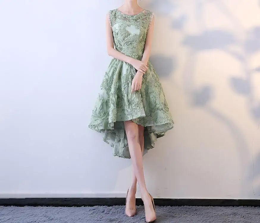 Светло-зеленое короткое спереди длинное сзади вечернее платье Элегантное