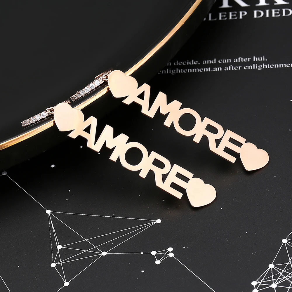 Женские серьги из розового золота с подвесками в виде букв|Серьги-кольца| |