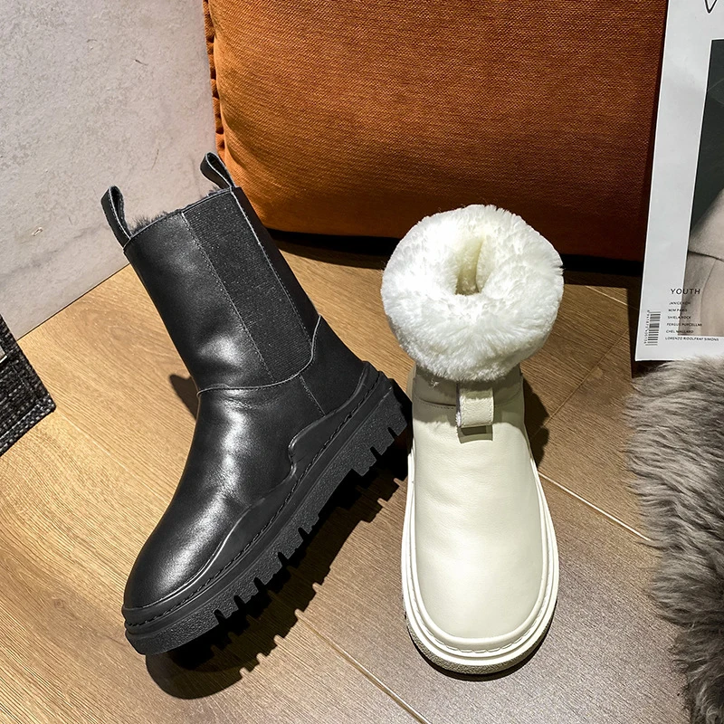 Женские кожаные зимние сапоги на платформе