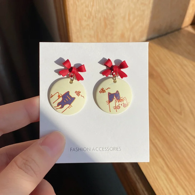 

Korean version of bowknot cat earrings fashion cute sweet painted earrings female wedding party earrings jewelry wholesale