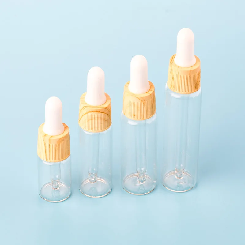 Стеклянная бутылка капельница с деревянным зерном пустая прозрачная стеклянная