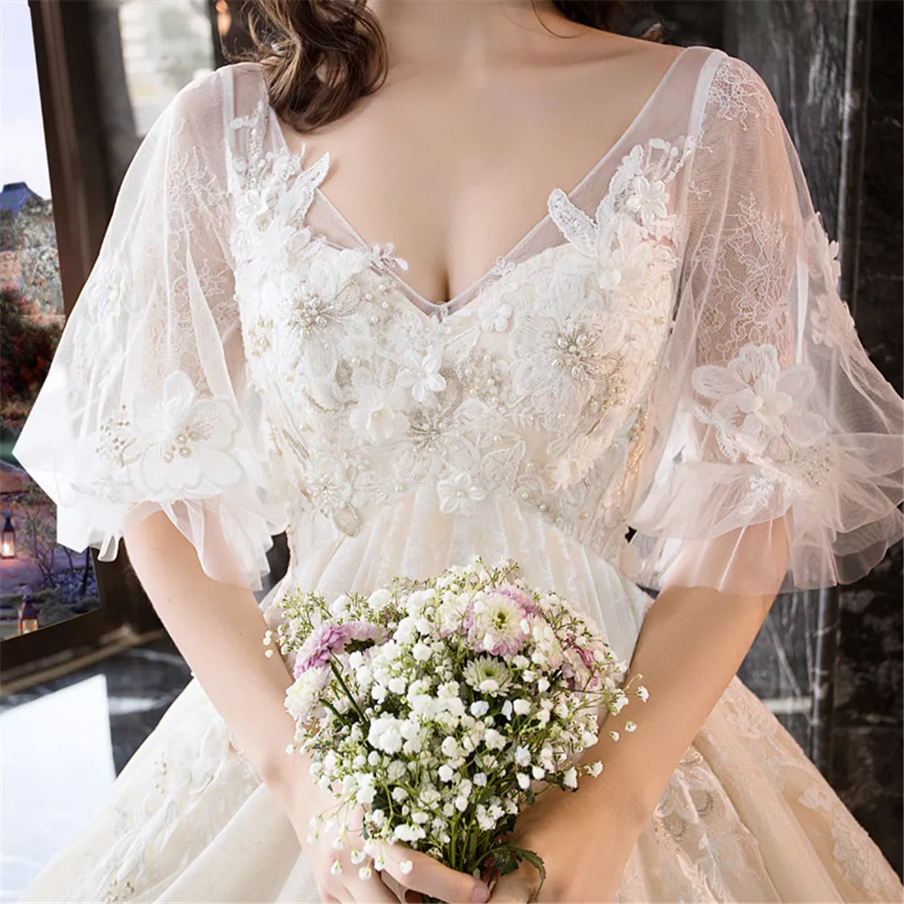 

SWEMILE Lace Tulle Bridal Ball Gown Wedding Dresses Backless Flare Sleeve Ivory Bride Gowns V Neck Customized Vestido De Novia