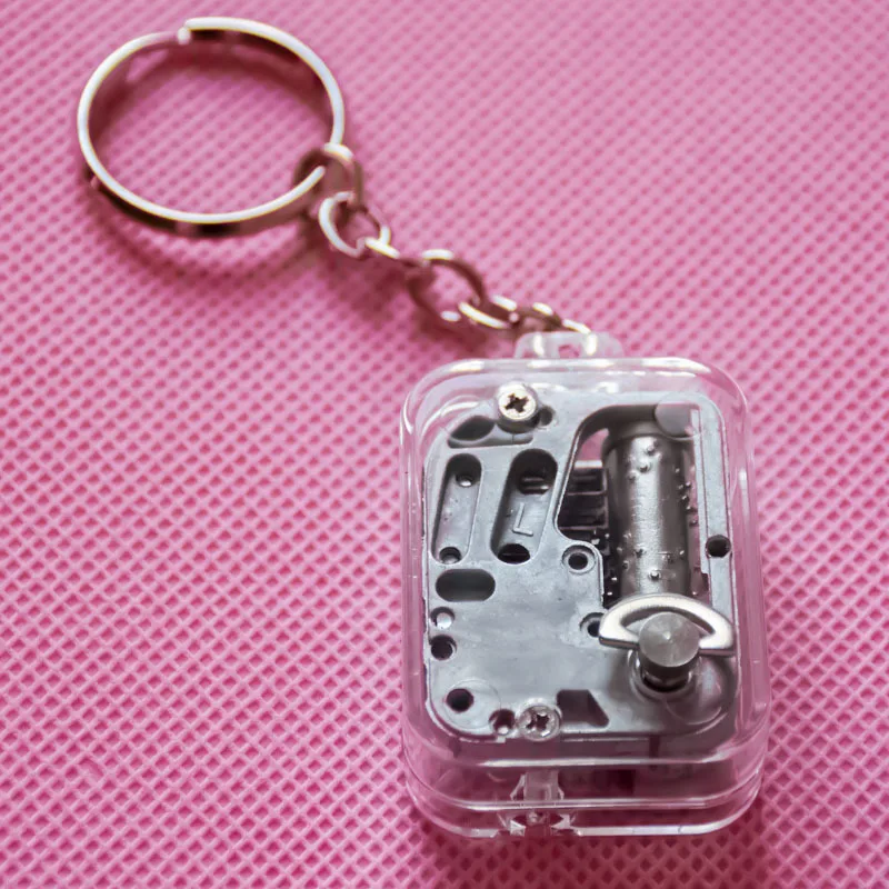 

1Pcs Mini Transparent Manual Winding Movement Square Keychain Pendant Music Box Music Box Birthday Gift Creative Gifts & Crafts
