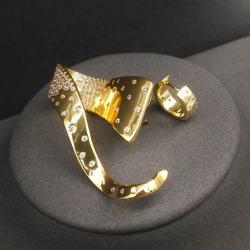 

s925 sterling silver August new asymmetrical gold color arc earrings female personality noble fashion high-end design sens