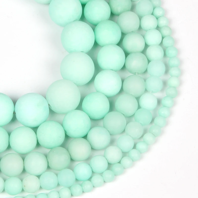 Круглые бусины из матового светло-зеленого агата незакрепленные натурального