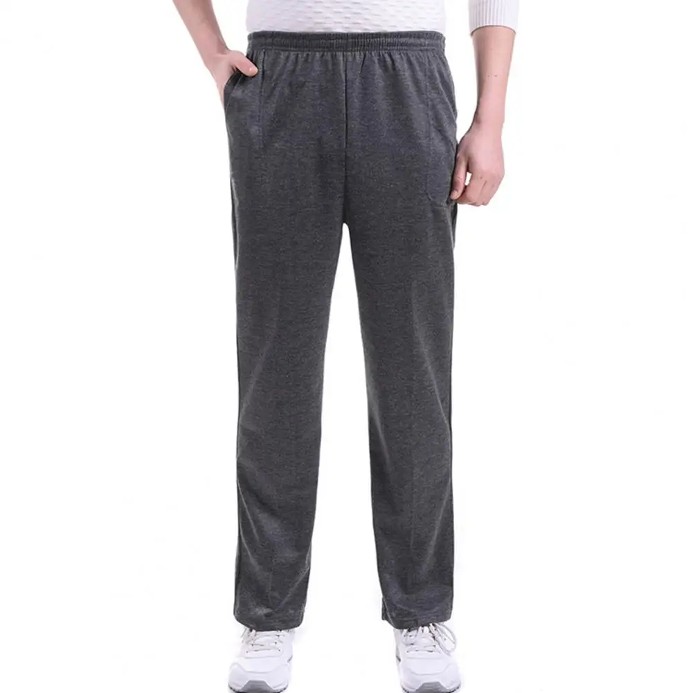 

Men Solid Color Pocket Loose Harem Pants Running Yoga Sports Sweatpants Trousers