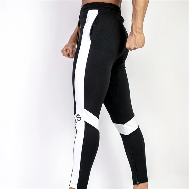Повседневные спортивные брюки Мужские Jogger Спортивные штаны тренажеры фитнес тренировки Брендовые брюки мужские осенние модные хлопковые спортивные штаны