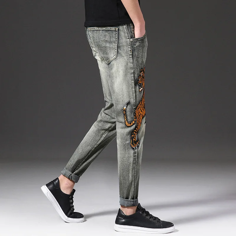 

Mens Streetwear Tiger Embroidery Hip Hop Ripped Skinny Jeans Fashion Motorcycle Destroyed Holes Casual Biker Male Denim Trousers