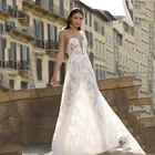 Прозрачное кружевное свадебное платье цвета шампанского с открытой спиной и шлейфом