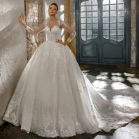 luxury wedding dresses long sleeve o neck lace applique charming gowns back lace up design shiny tulle court train ball gown
