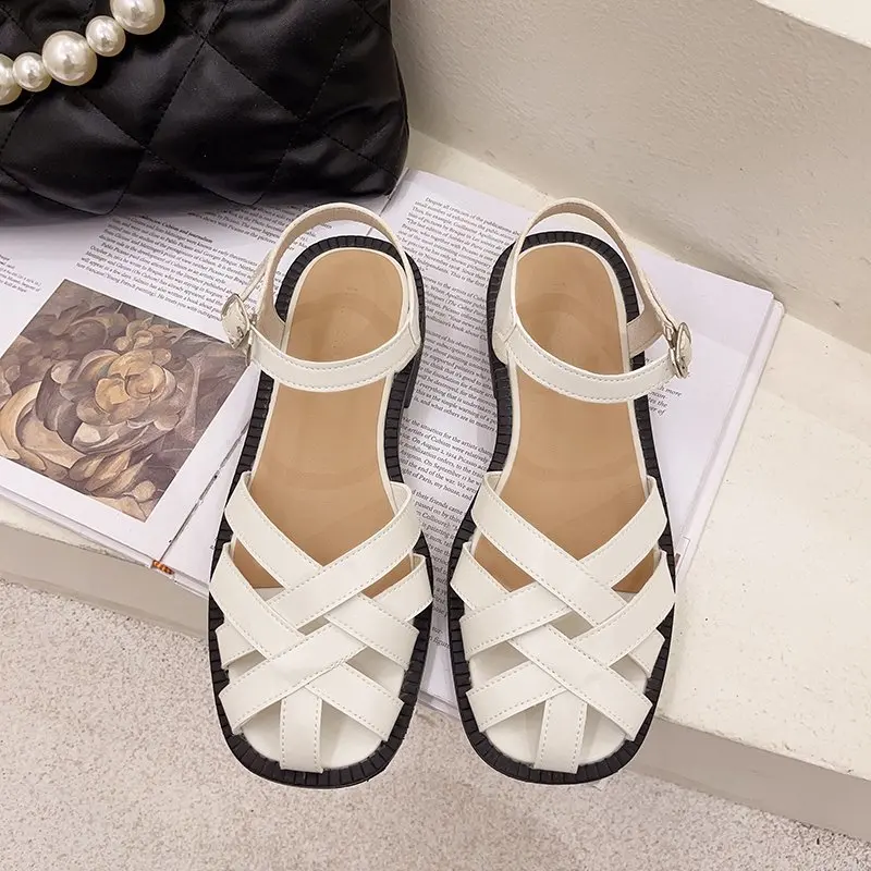 

2021 summer new hollow fashion Baotou sandals female students retro word buckle casual Roman shoes ins tide X792