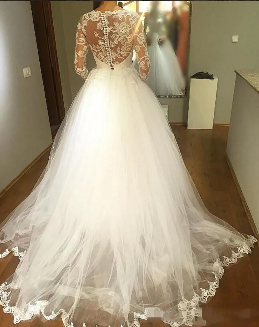 Изысканное свадебное платье с длинным рукавом белое кружевной аппликацией