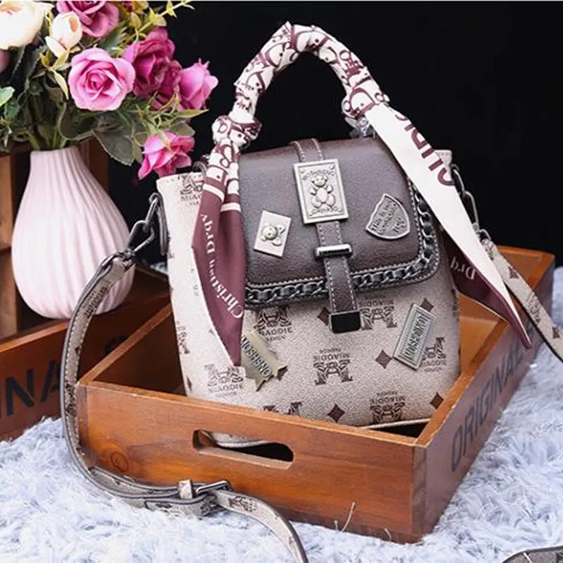 

Famous Genuine Leather 2021 New Fashion Badge All-match Casual One-shoulder Messenger Bucket Bag Designer Handbags High Quality