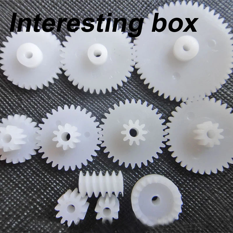 Выбор из 11 видов пластиковых принадлежностей игрушек пакетов моторных