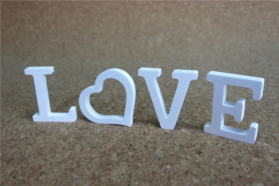 

Wholesale Free standing 11 CM wedding decoration white letters Artificial wood letters used for name logo pattern