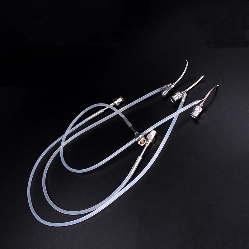 

Injection and suction needle, double parallel tube injector, 12 o'clock or so, ocular lacrimal duct cleaning