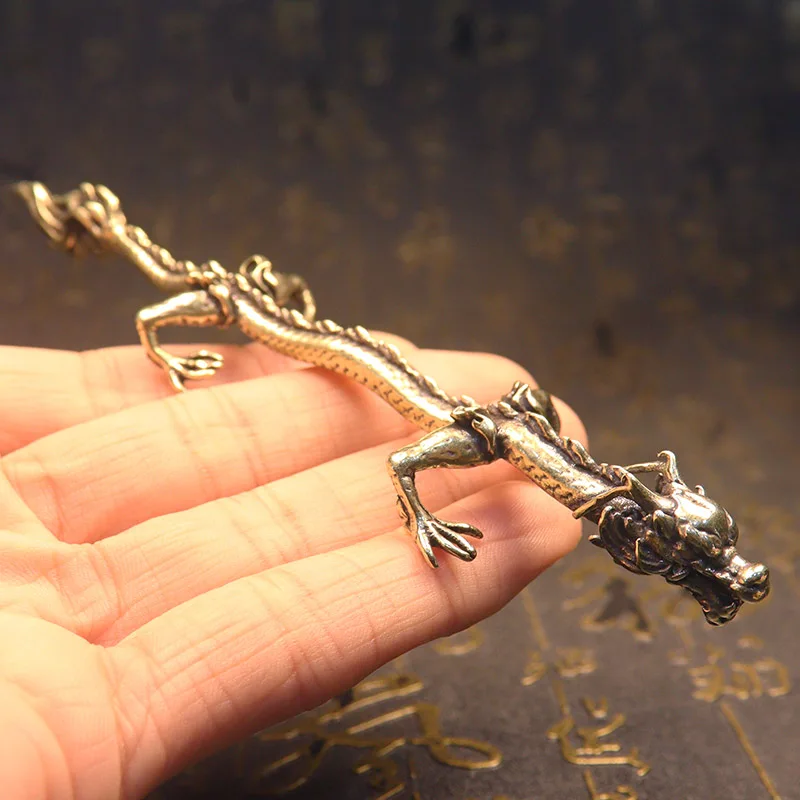 

Медная статуэтка дракона