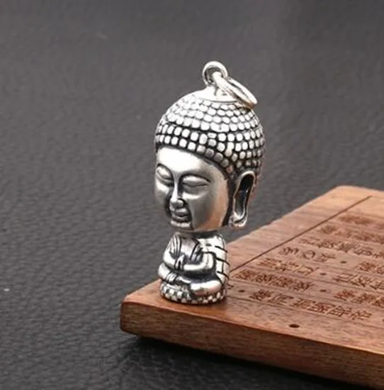 

Изысканная тибетская Серебряная резьба Sakyamuni Buddha Маленькая подвеска