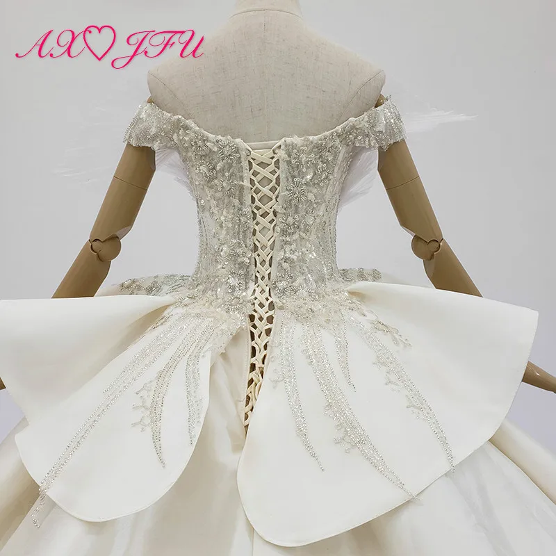 

AXJFU luxury princess sparkly beading crystal illusion handmade boat neck white lace ruffles wedding dress 100% real photos