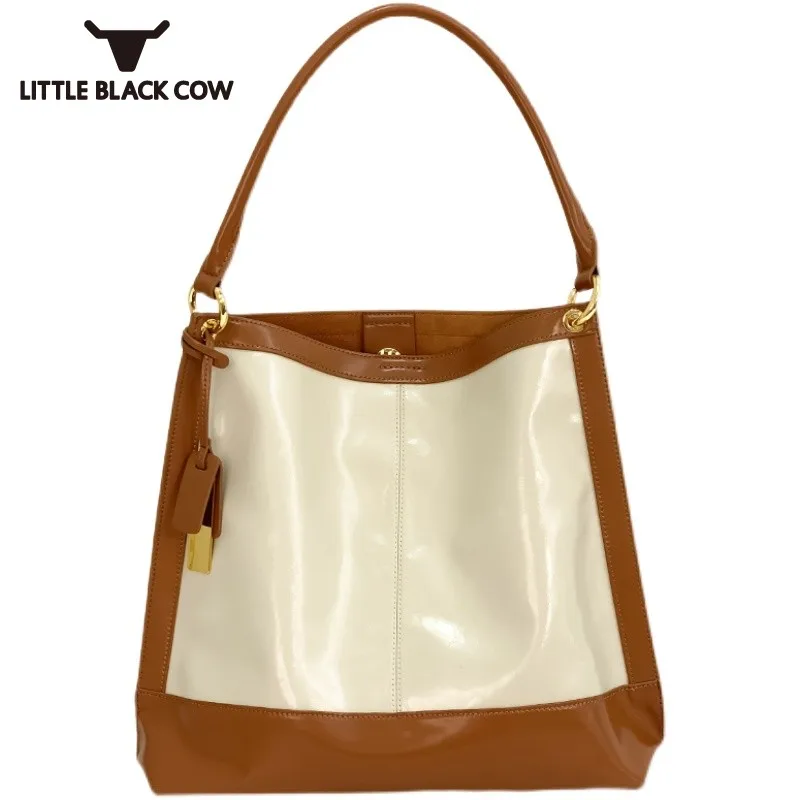 

Женские дизайнерские сумки-тоуты, офисные сумочки на молнии через плечо от известного бренда, модные дамские чемоданчики из натуральной ко...