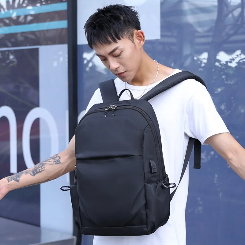 

2021 new casual pure color men's backpack Korea fashion fashion backpack business joker computer bag man