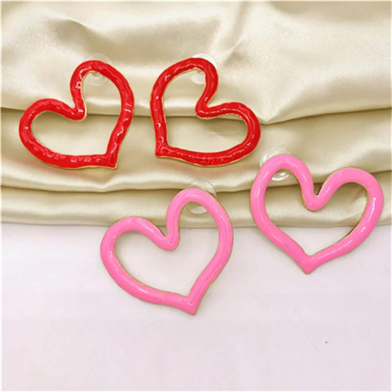 

European and American style lively temperament of contracted design of small red enamel glaze heart-shaped earrings