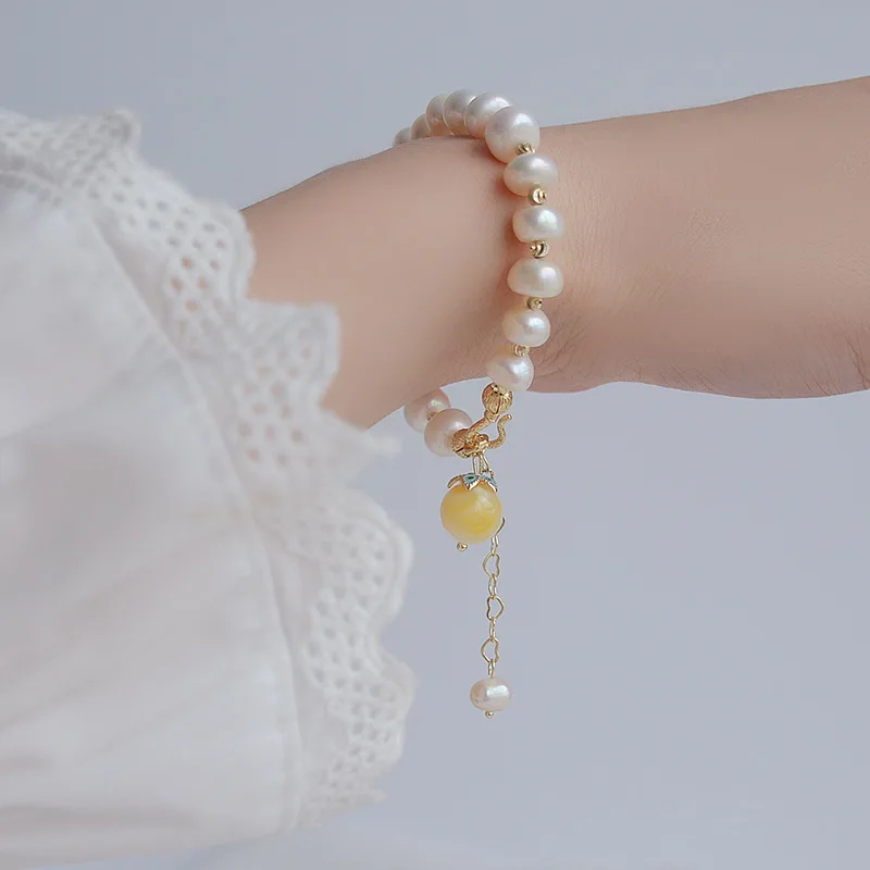 

Браслет-манжета женский с натуральным барочным жемчугом, позолоченный 14 к