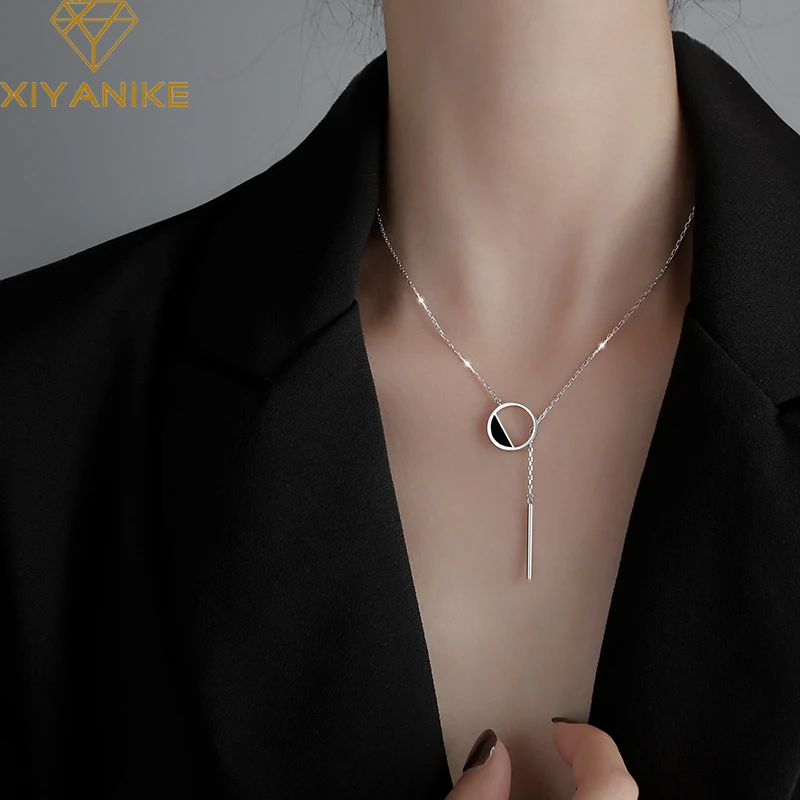 

XIYANIKE Silver Color Black Round Hollow Tassel Necklace Female Simple Temperament Sweater Chain Fashion Handmade Jewelry