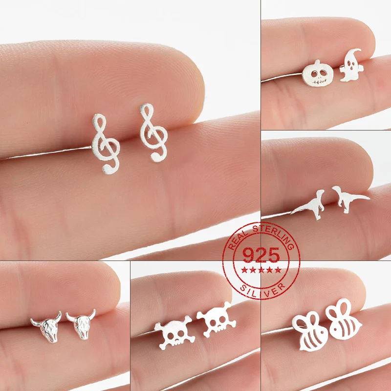 

Серьги-гвоздики женские из серебра 100% пробы в виде динозавра