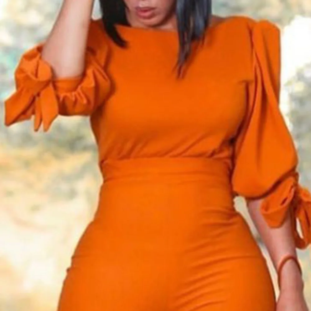 Комплект из двух предметов: Топ и штаны с высокой талией оранжевого цвета