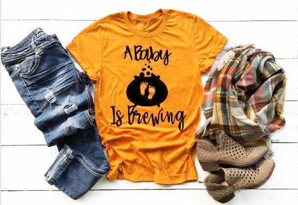 

A Baby Is Brewing t-shirt Halloween Pregnancy Announcement funny slogan graphic feet print cute tee tumblr top gift shirt-J776