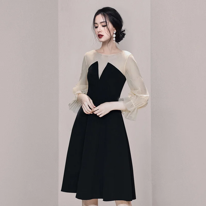 

Женское вечернее платье средней длины, с длинным рукавом