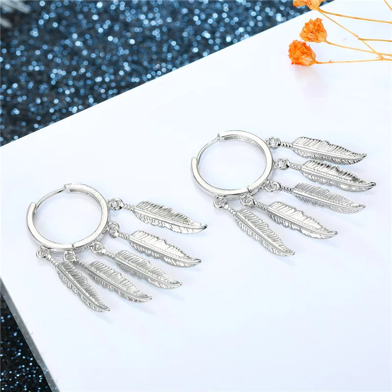 1 Пара винтажных золотых серег в форме перьев Европейские женщины уникальные модные многочисленные серьги на длинных листьях круглой формы ювелирных изделий.